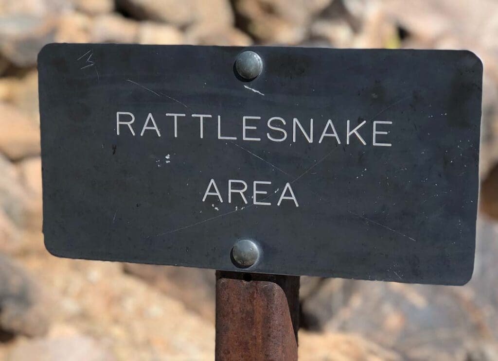 Sign stating rattlesnake area